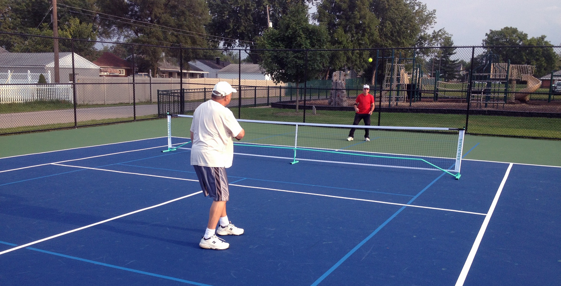 playing pickelball court